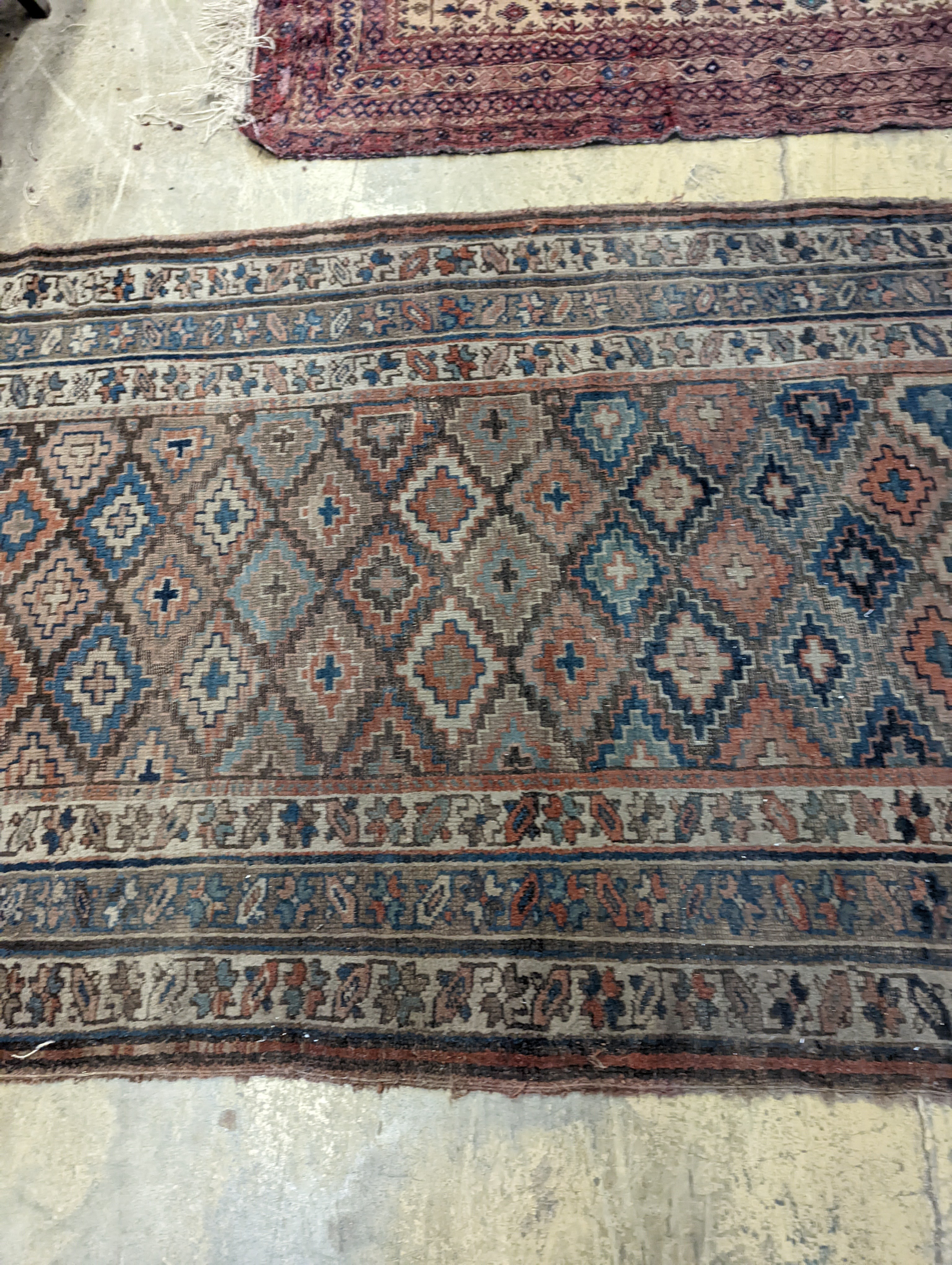 An antique Caucasian runner and a Belouch rug, larger 284 x 134cm